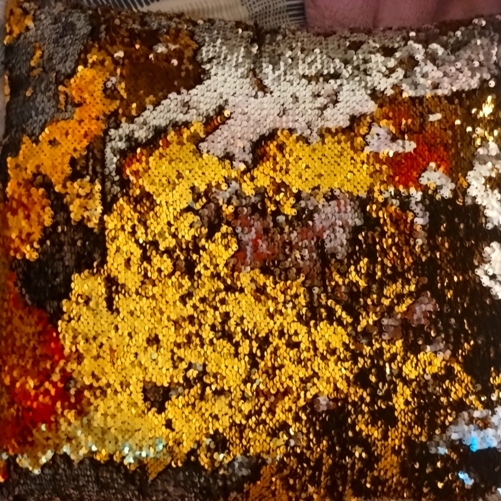 A sequin pillow only used once